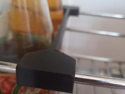 Metal frame cabinet divider for oils and wine