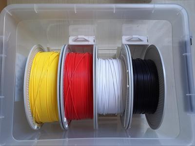 Drybox spool and desiccant holders