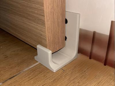 Wall attached barn door guide