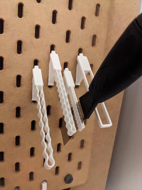 Skådis scraper holder