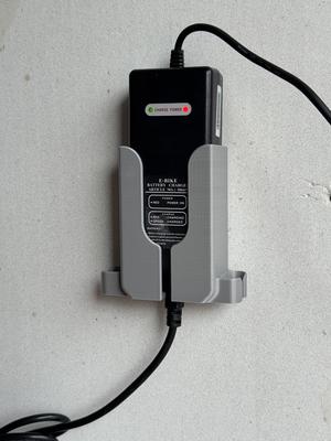 Pointer e-bike charger holder