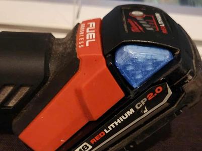 Milwaukee M18 battery release tab