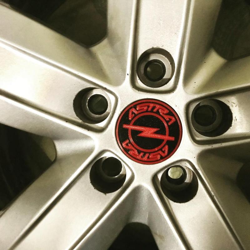 Opel Astra wheel rim cap