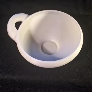 One-handled bowl with decorated rim