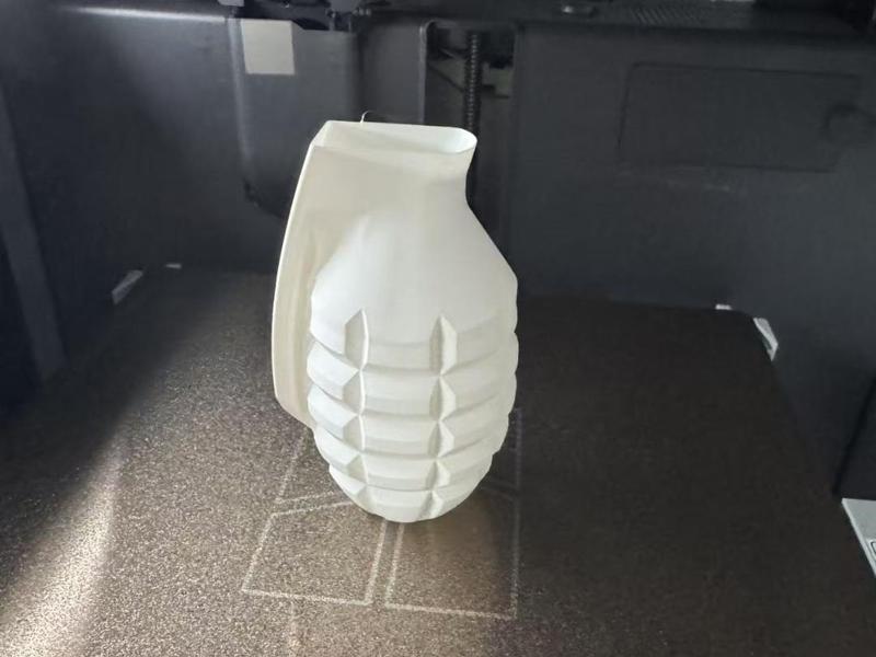 A perfect place for bamboo waste, a grenade printed in rotating vase mode