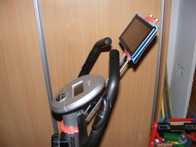 Tablet/phone holder for stationary bicycle