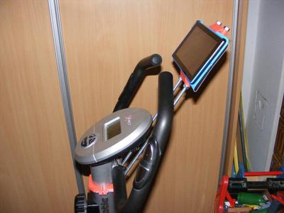 Tablet/phone holder for stationary bicycle