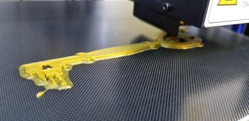 Disney fan castle key with a mickey door.