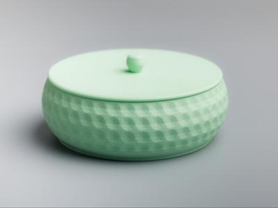 Stackable tray with lid.