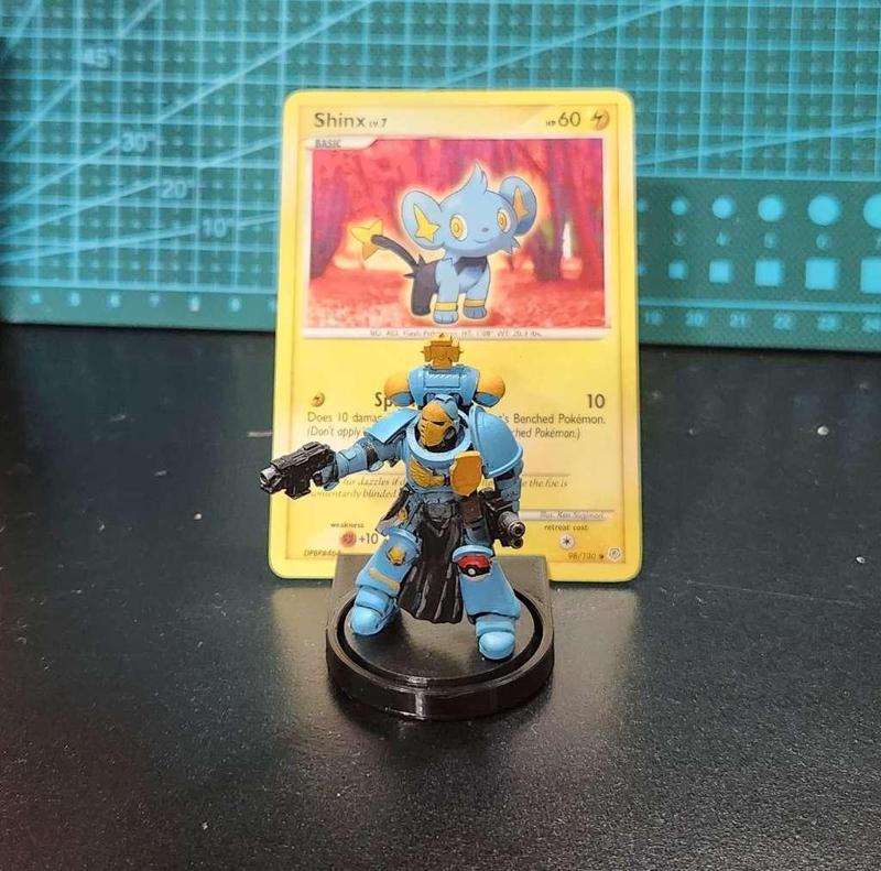 display stand for 32mm base with Pokémon card