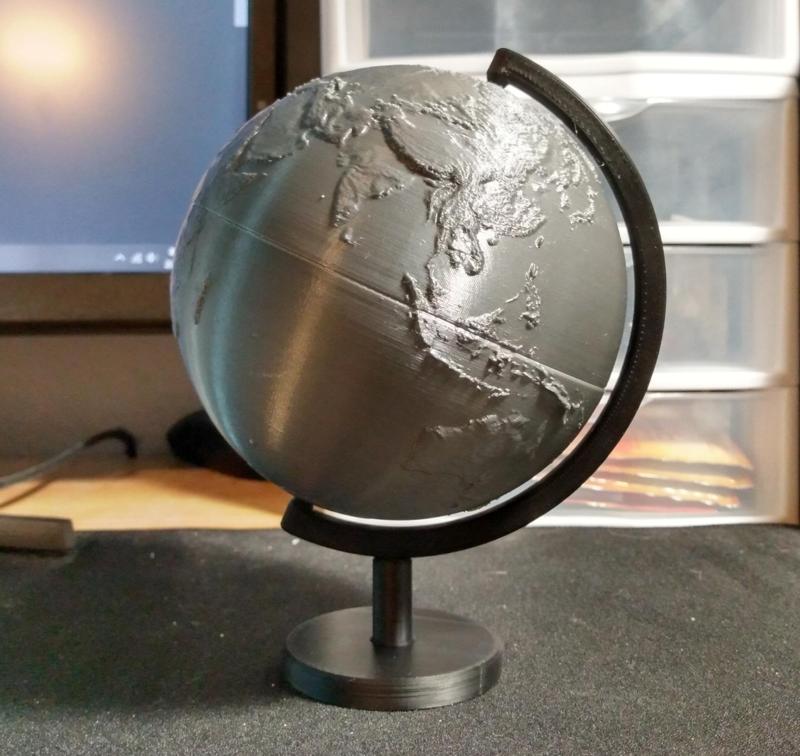 Topographic globe with stand