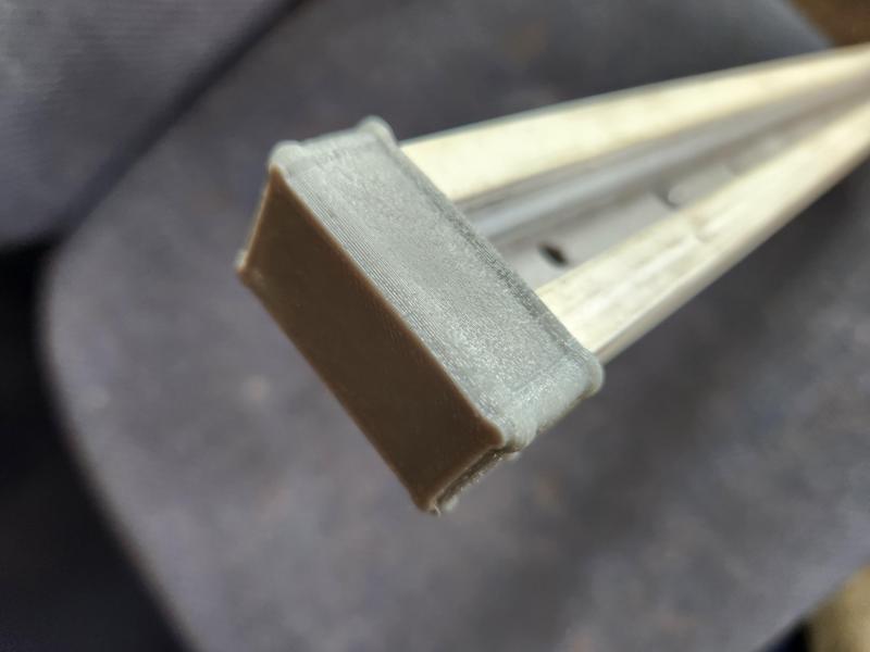 light track flexible end cap for transport