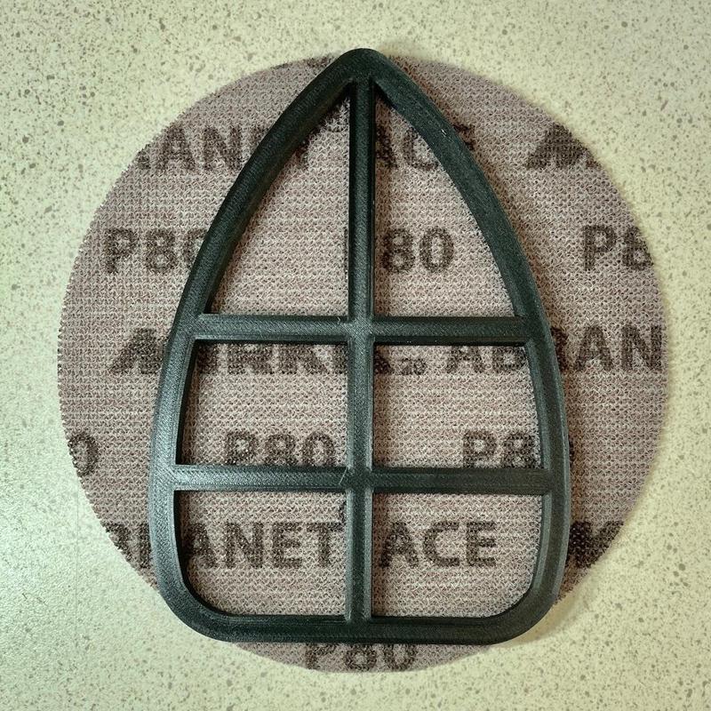 Template to cut sandpaper to fit Ryobi Palm Sander.  