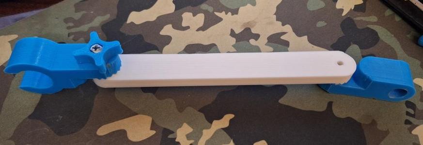 Extension for adjustable shower head holder