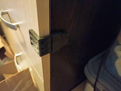 Child-proof drawer fastener
