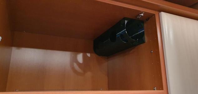 Holder for hand blender in a kitchen cabinet