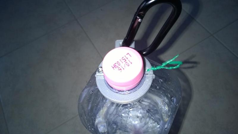 Bottle holder for hiking and jogging with hole for carabiner