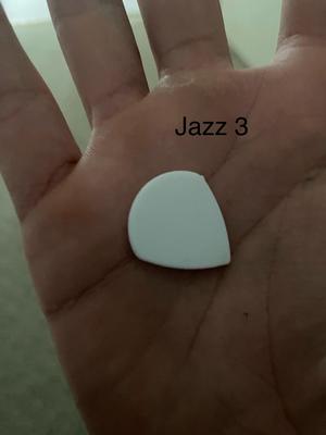 different thickness guitar picks including jazz 3