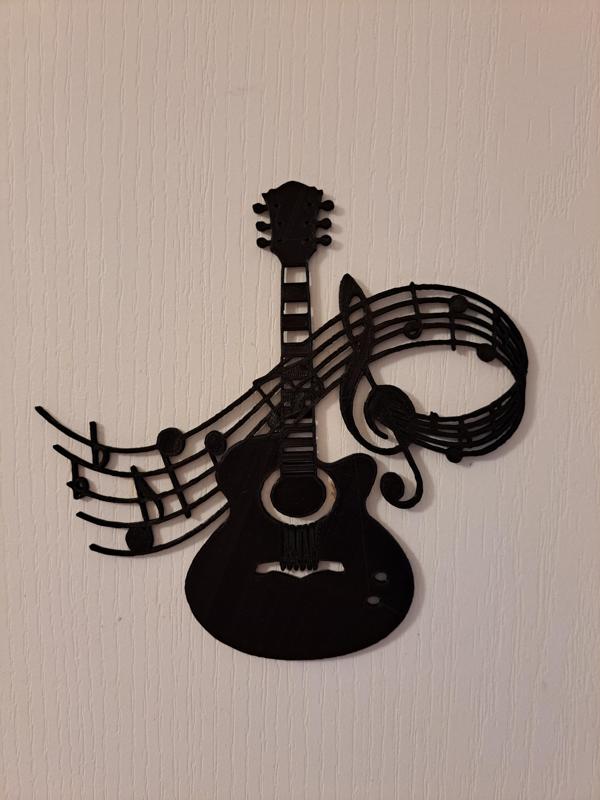 Music note with a guitar