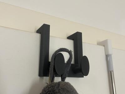 Door panel coat rack