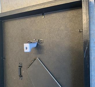 Elongated picture hanging hook