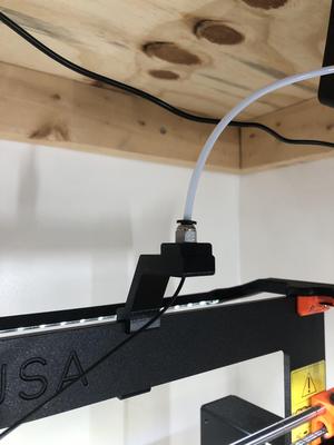 Filament guide for pneumatic fitting