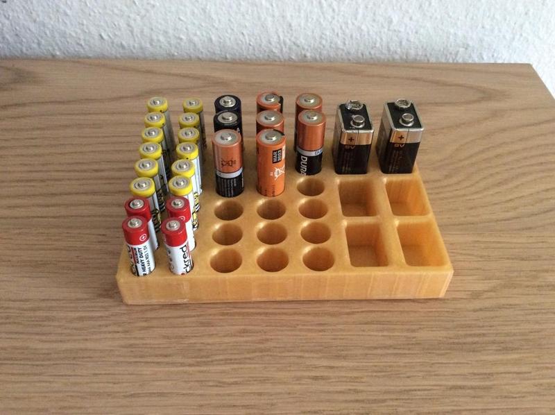 Battery holder for AA, AAA and 9V batteries