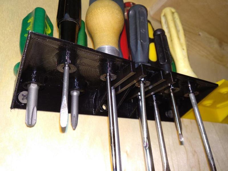 Screwdrivers mount to the wall