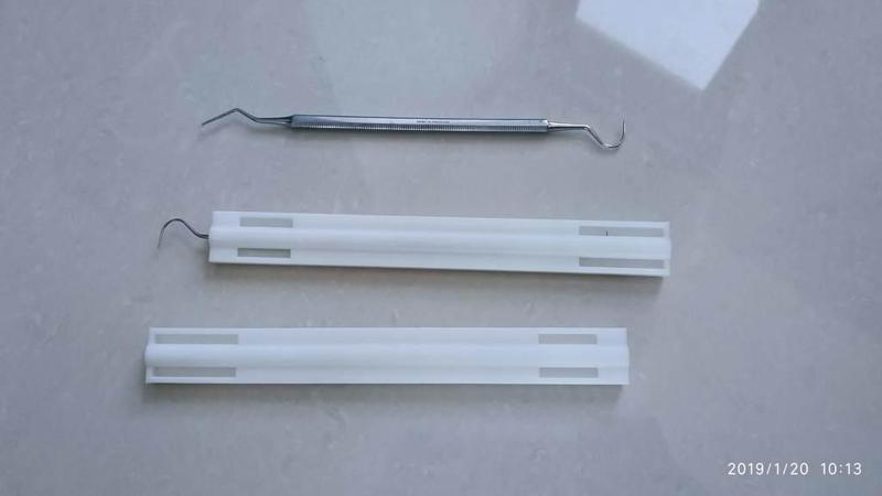 A box that holds a scale removal tool.