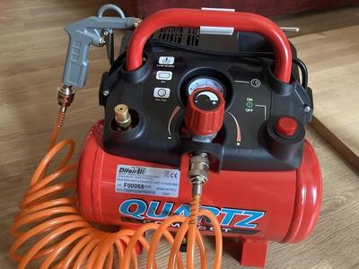 Blow gun holder for compressor