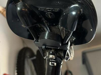 Airtag holder for bike saddle rails