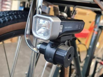Bicycle light bracket for front rack etc