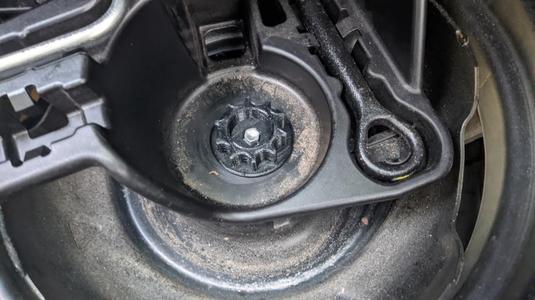 Prius spare tyre clamp
