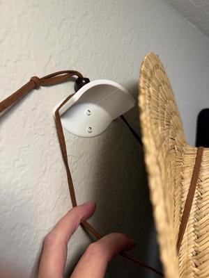 Hat hook with double nail and string lip   