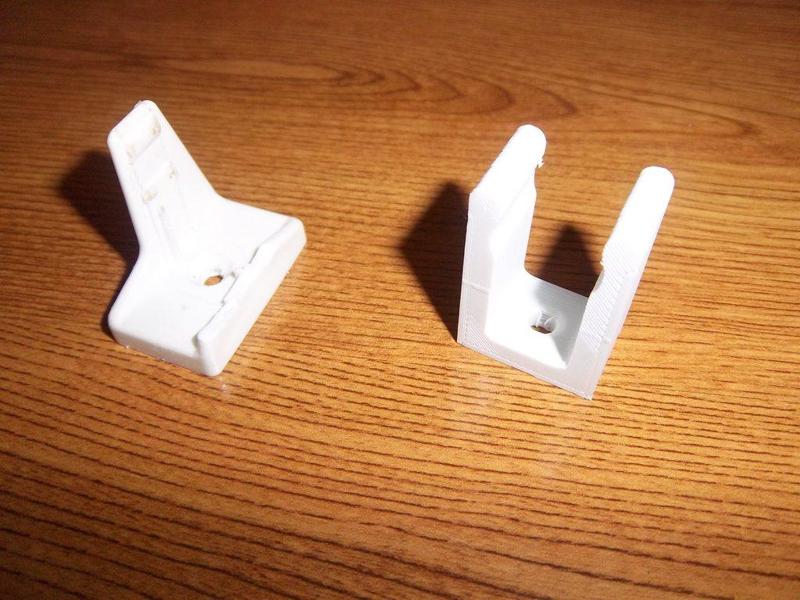 Maintien de manivelle de volet.