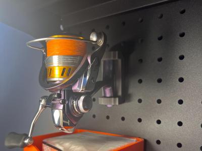 Pegboard Fishing Reel Display Stand