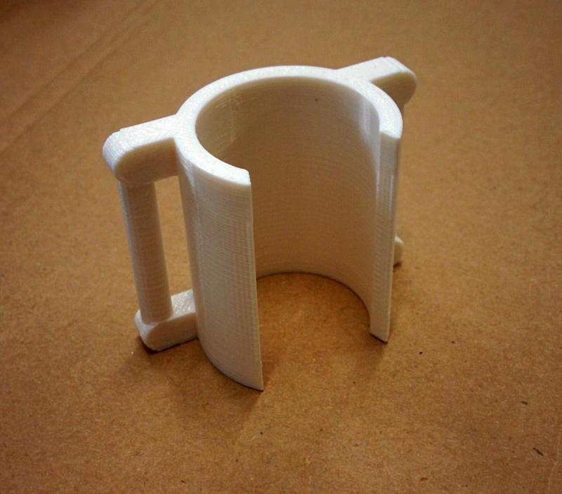 Backpack clip for 25mm diam tripod/monopod/...