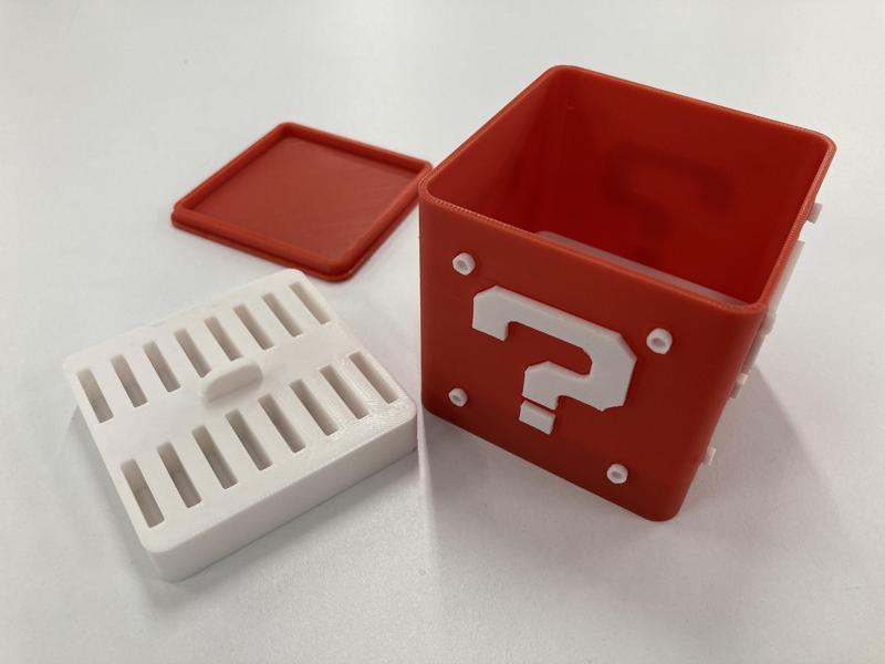 Mario Bros Question Block themed case with 32 Nintendo Switch cartridge slots