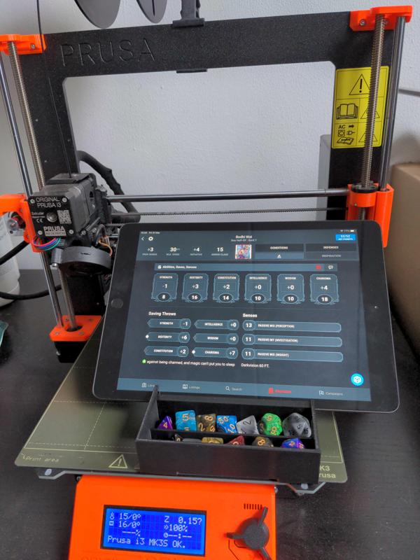 Dice holder and tray with integrated tablet stand