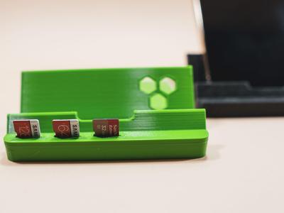 Phone Holder Stand with microSD cards.