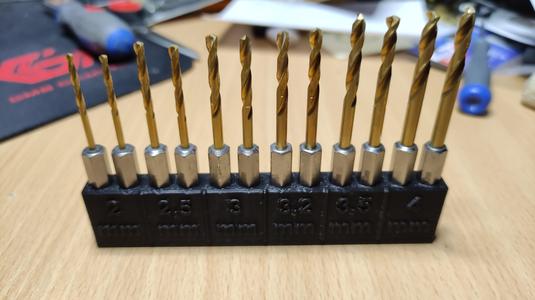 Drill holder with magnet cavity