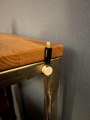 Magnet clip for a charging cable