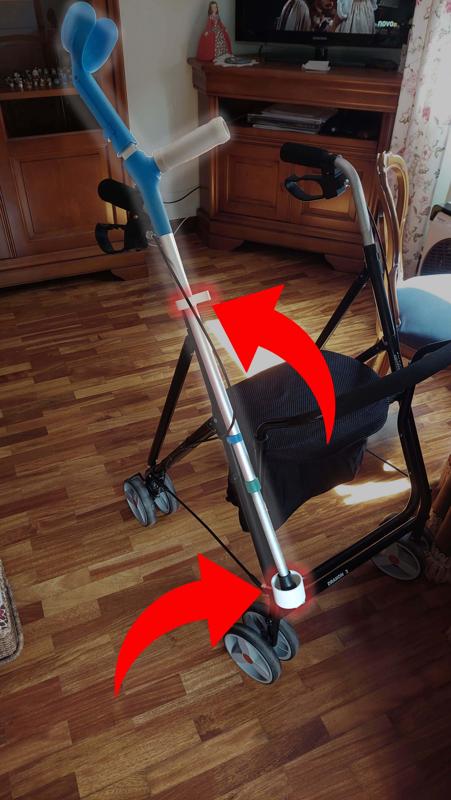 Crutch holder for elderly woman's walker