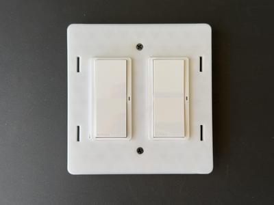 Thin Lutron Caseta Pico Remote holder for use with Wyza's screwless switch cover