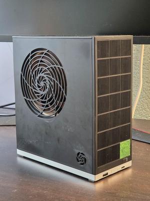 Framework Destktop side panel with Noctua-style fan grill but slightly better