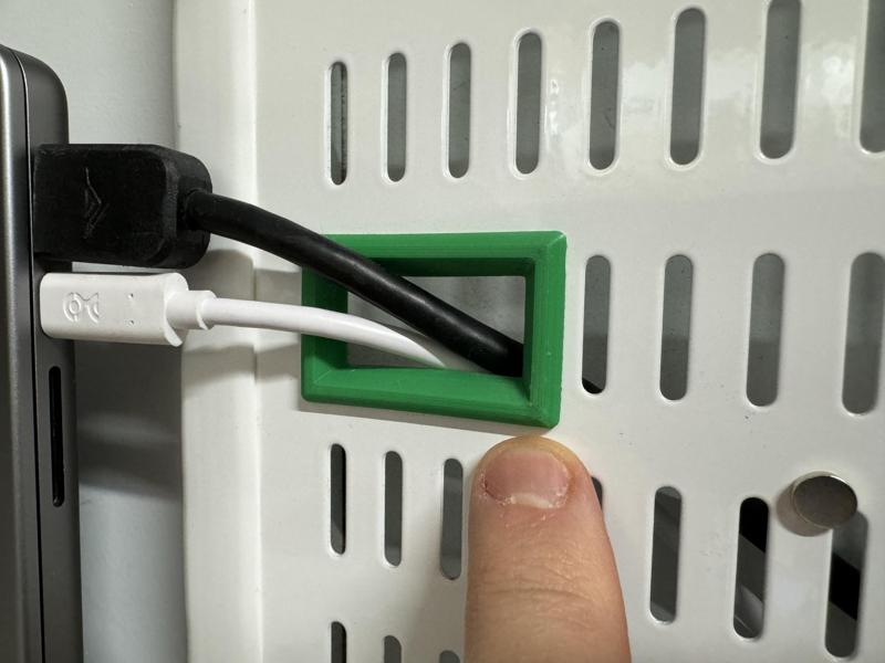 Elfa pegboard through-hole wireway bezel