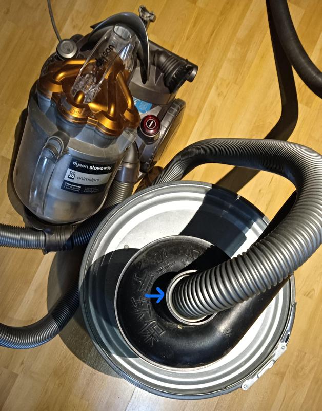 Adapter to connect a Dyson vacuum cleaner to a cyclone/barrel.