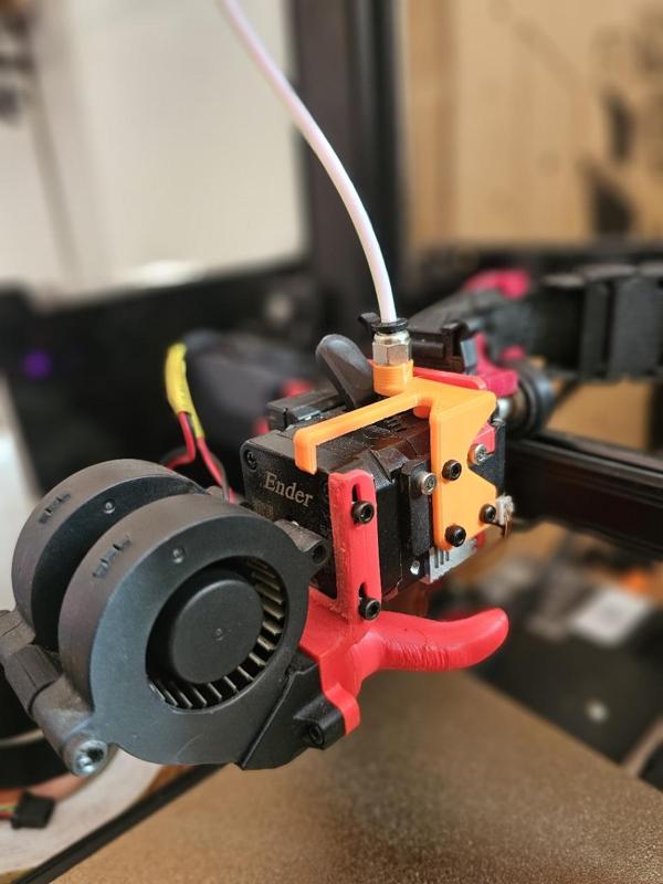 Reverse Bowden adapter for Ender 3 S1 with printed threads.
