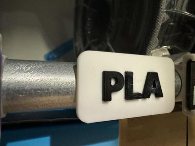 RepRack label clip for 18mm conduit