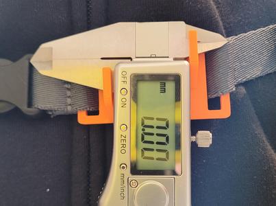 Backpack caliper holder